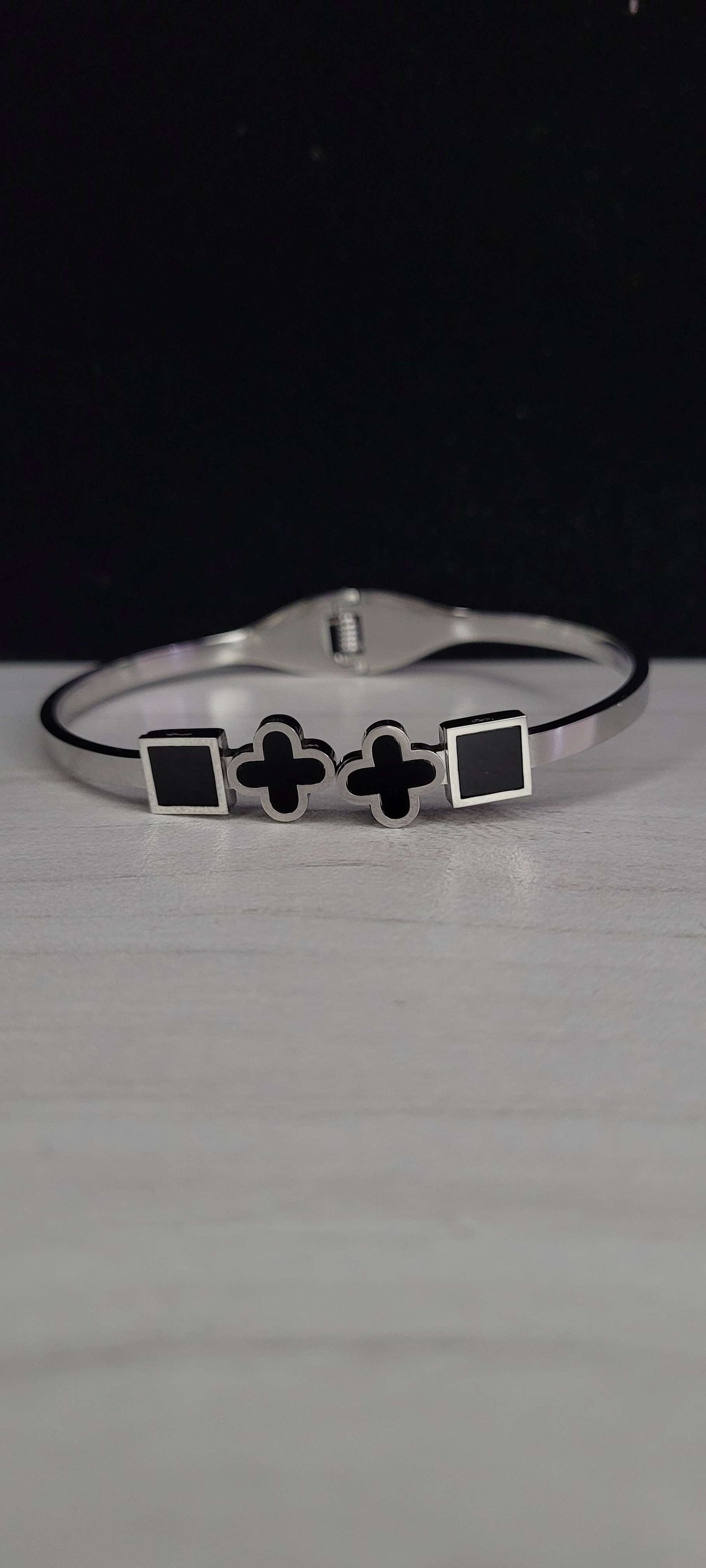 BLACK CLOVERS WITH SQUARES
