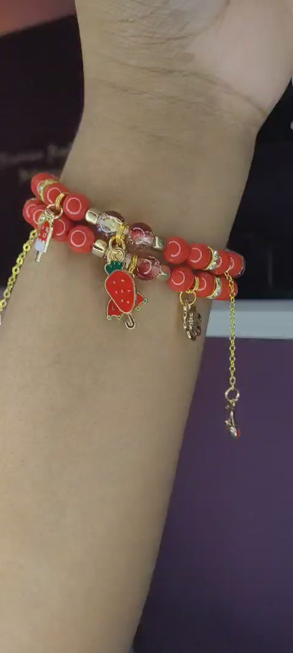 Red three charm bracelet